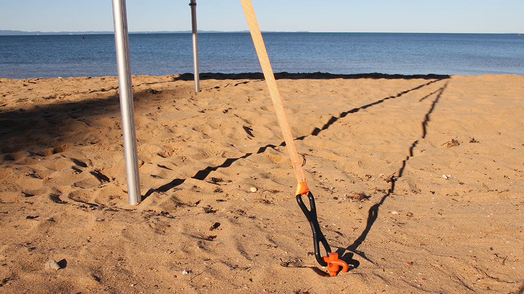 Stay Anchored in the sand: Why Sand Dog screw in pegs™ are your beach day essential